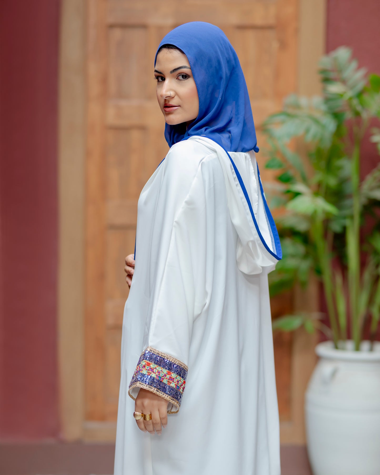 Elegant White Abaya with Blue Embroidered Sleeves