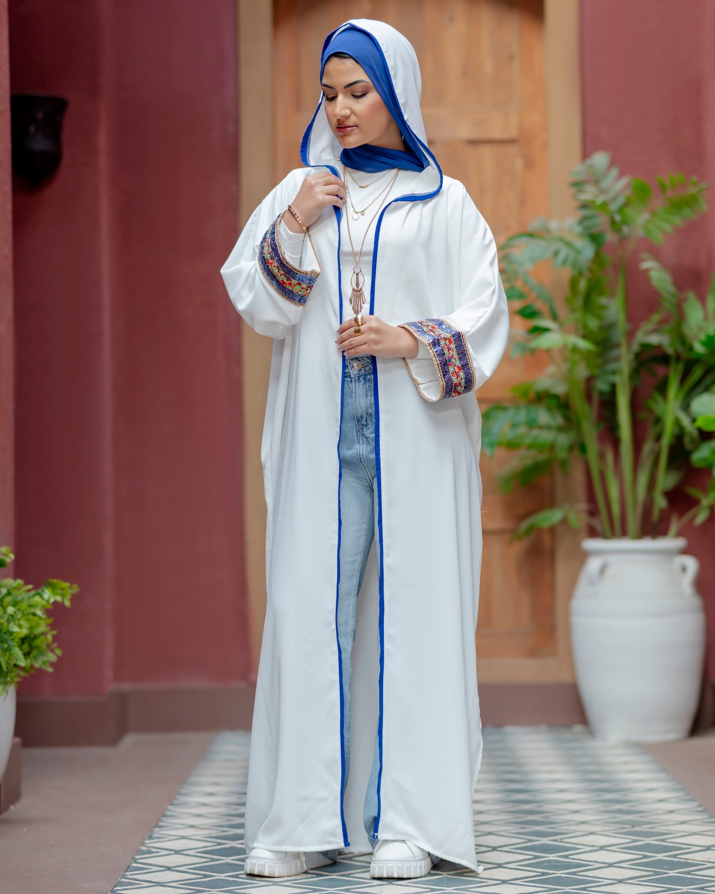 Elegant White Abaya with Blue Embroidered Sleeves