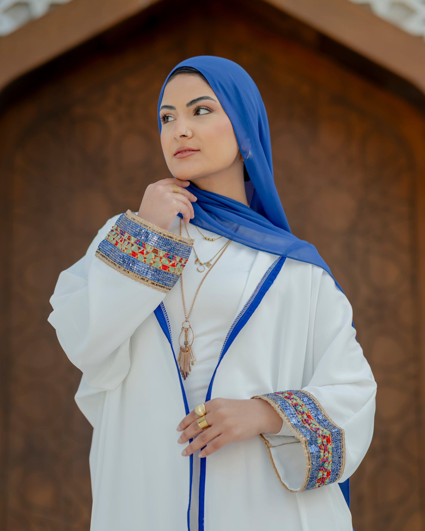 Elegant White Abaya with Blue Embroidered Sleeves