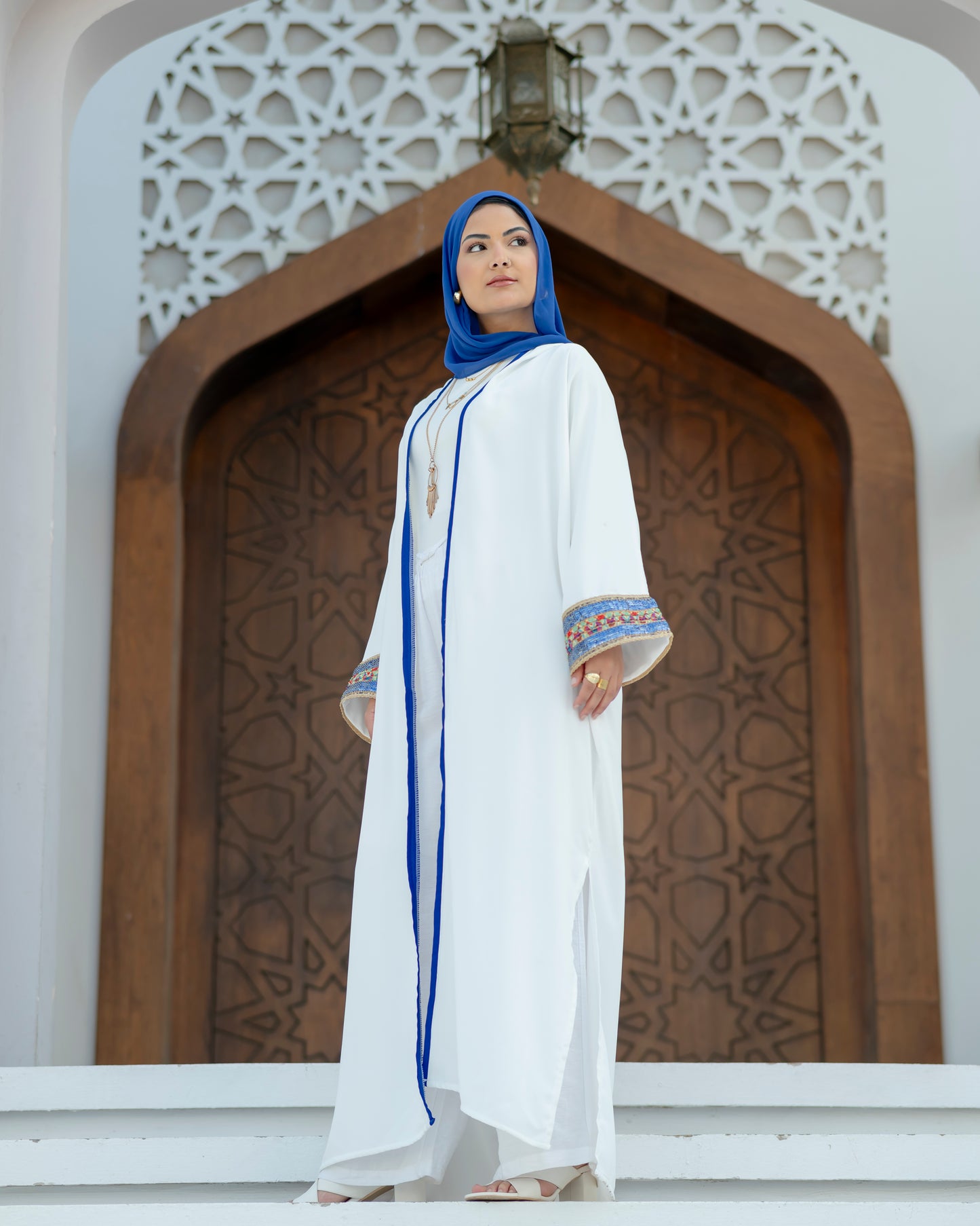 Elegant White Abaya with Blue Embroidered Sleeves