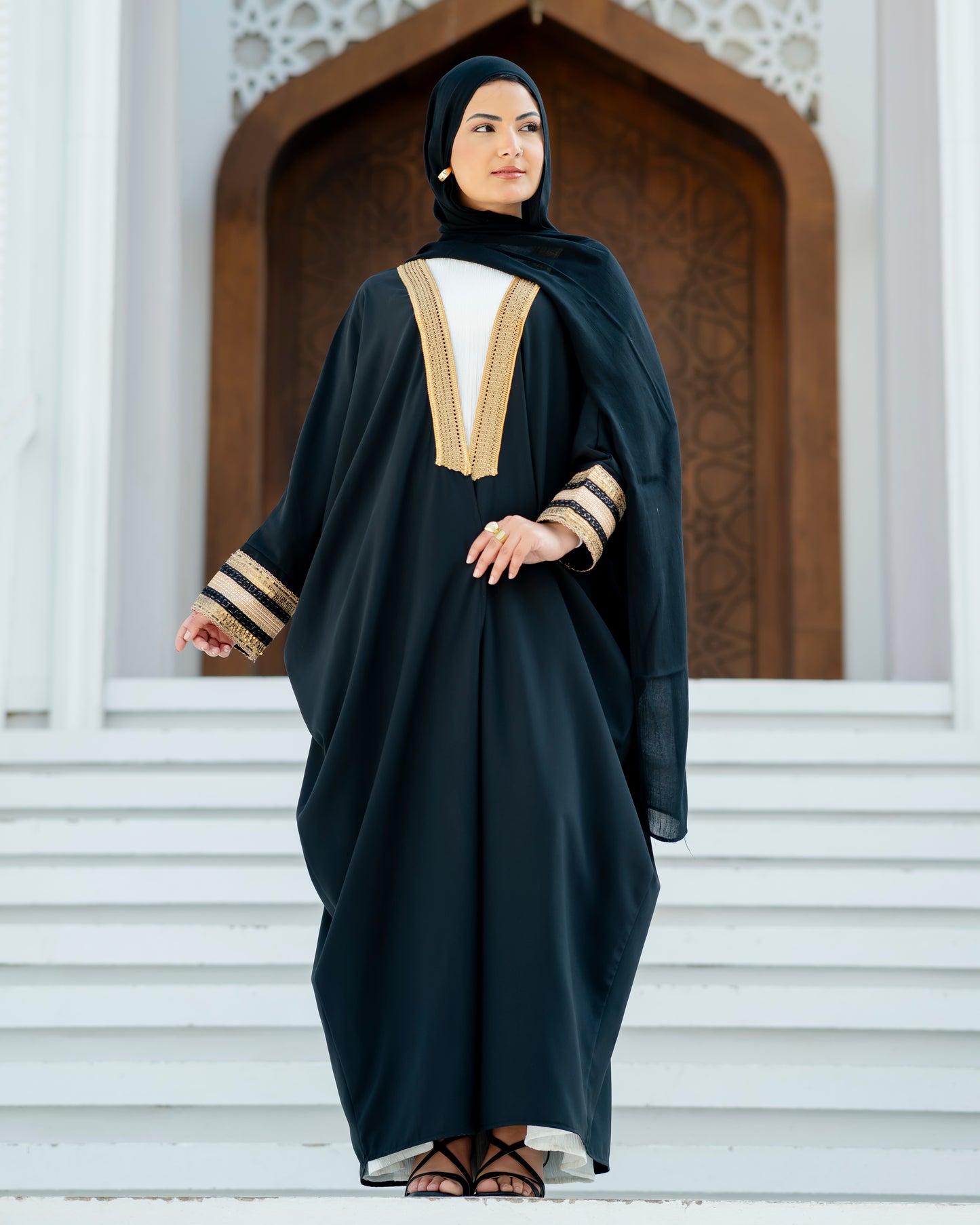 Elegant White Abaya with Blue Embroidered Sleeves